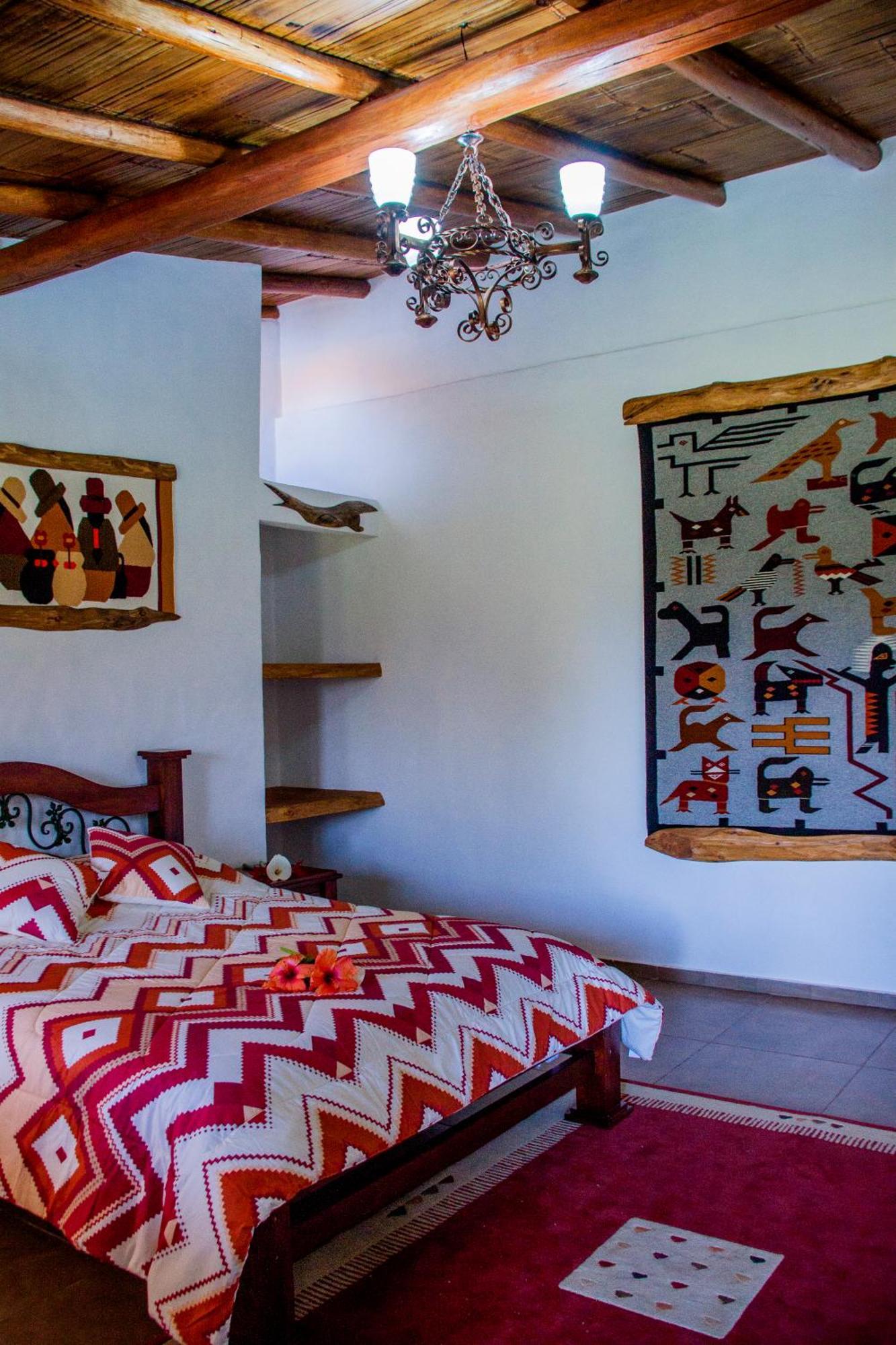 Zaysant Ecolodge Пуэмбо Номер фото