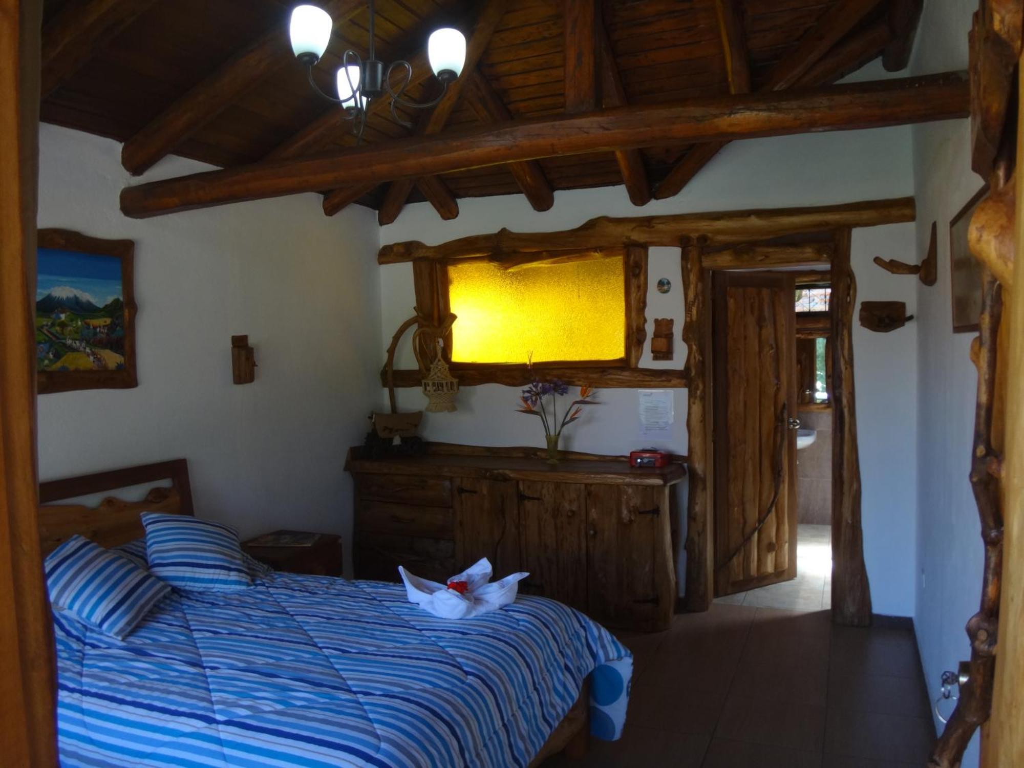Zaysant Ecolodge Пуэмбо Номер фото